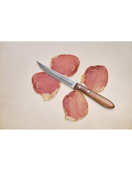 Cuchillo chuletero de hoja de acero inoxidable dentada de 105 mm y mango de Madera de haya comprimida y laminas de resina.